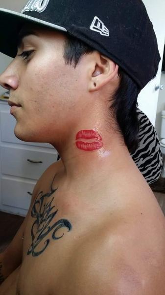 Process of having a lips neck tattoo